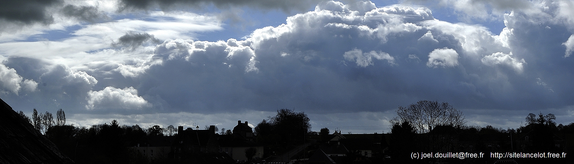 Rainy sky over a village in the west of France.